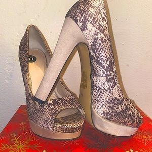 Size 8 snake skin peep toe heels from  le chateau